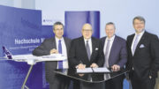 Die Kooperation erneuert (von links): Gunnar Groß (Airbus), Professor Dr. Bernt R. A. Sierke (PFH), Kai Arndt (Airbus) und Professor Dr. Frank Albe (PFH). Foto: Airbus